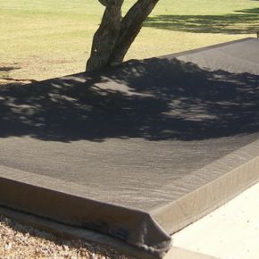 Weighted edge sand pit cover