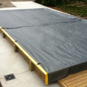 Weighted edge sand pit cover